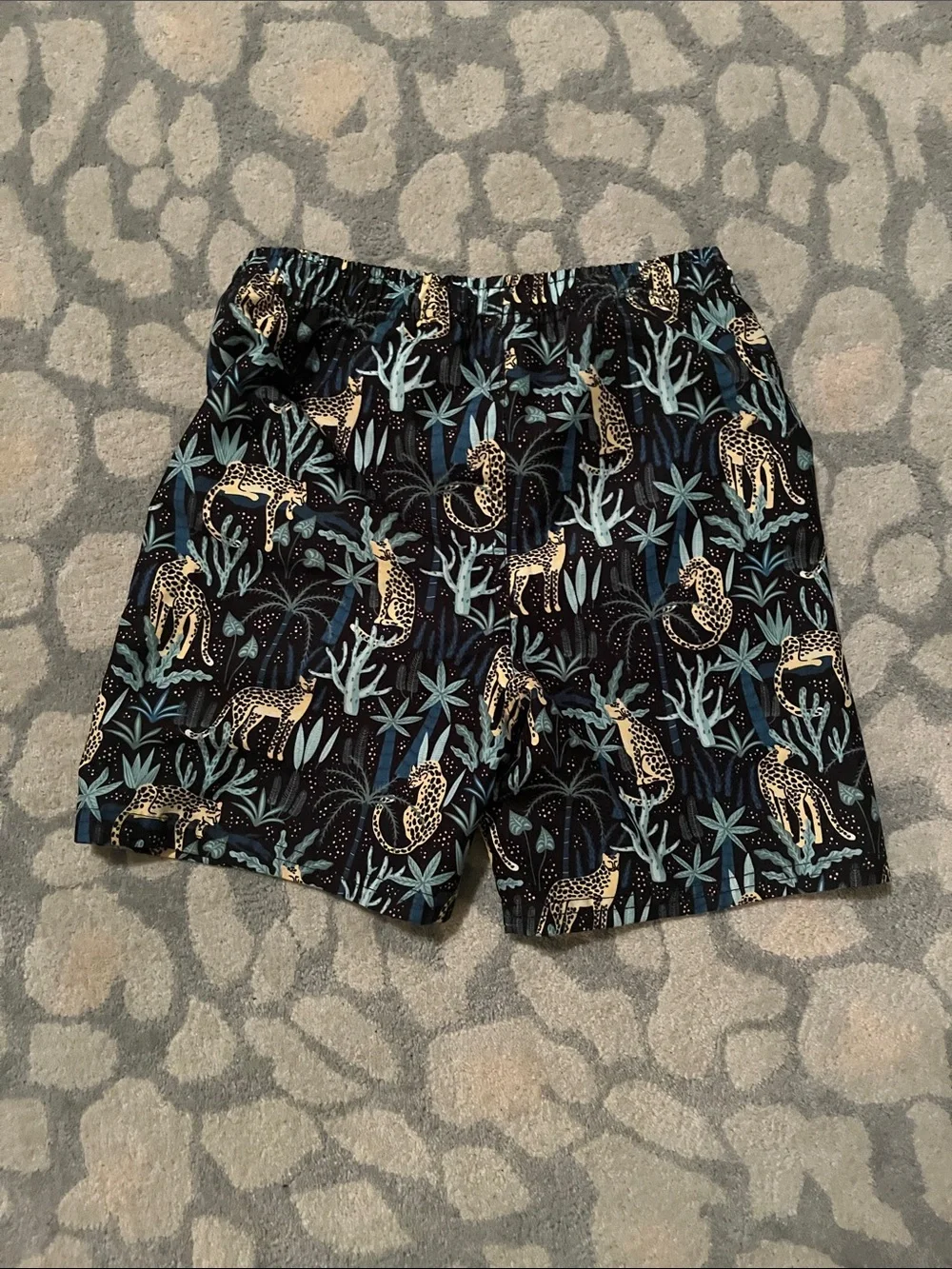 Ruffle Butts Black Swim Trunks with Teal and Gold Leopard Print